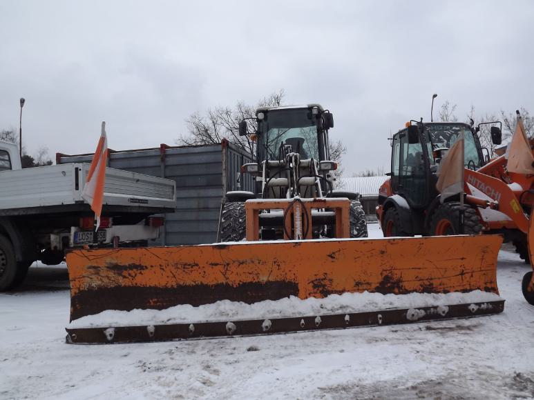 Traktor mit Schiebeschild